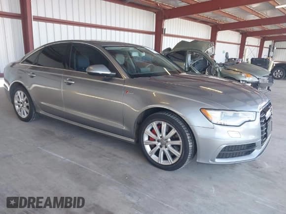 ✅ 2012 Audi A6 Prestige • VIN: WAUHGAFC6CN080091 • Lot: 41964023. Listed on IAAI with 166,334 mi. Free auction sales archive from the USA and detailed vehicle history report at DreamBid. Image 1.