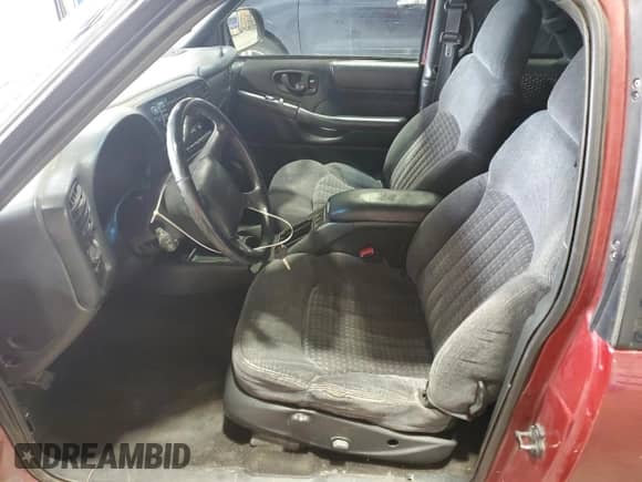 1999 Chevrolet Blazer LS z VIN 1GNCT18W7XK193241, wystawiony jako Copart lot #69390194 z przebiegiem 188 720 mil mil oraz Czysty tytuł • Clean title. Historia ofert i sprzedaży dostępna na DreamBid. Obrazek 7.