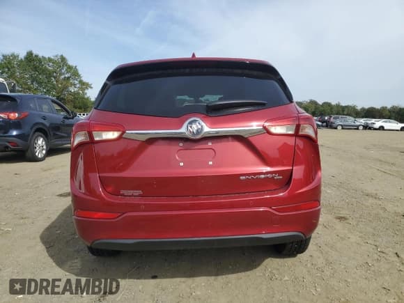 ✅ 2020 Buick Envision Essence • VIN: LRBFX2SA3LD121205 • Lot: 84269485. Listed on Copart with 53,545 mi. Free auction sales archive from the USA and detailed vehicle history report at DreamBid. Image 6.