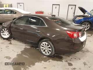 2015 Chevrolet Malibu LTZ z VIN 1G11F5SL0FF203329, wystawiony jako IAAI lot #41310725 z przebiegiem 81 968 mil mil oraz . Historia ofert i sprzedaży dostępna na DreamBid. Obrazek 3.