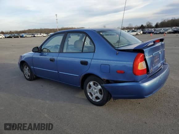 2001 Hyundai Accent GL with VIN KMHCG45C11U193879, listed as a Copart auction lot 37525334 with 150,951 mi miles and Salvage title. Bid and sale history available at DreamBid. Image 2.