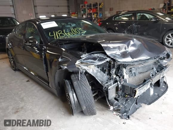 ✅ 2022 Kia Stinger GT1 • VIN: KNAE45LC2N6103659 • Lot: 41866003. Listed on IAAI with 56,579 mi. Free auction sales archive from the USA and detailed vehicle history report at DreamBid. Image 1.