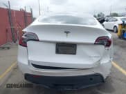 ✅ 2023 Tesla Model Y Long Range • VIN: 7SAYGAEE9PF702910 • Lot: 42199519. Wystawiony na IAAI z przebiegiem 91 094 mil. Bezpłatny archiwum sprzedaży aukcyjnych z USA i szczegółowy raport historii pojazdu na DreamBid. Zdjęcie 16.