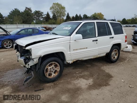 ✅ 1998 Jeep Grand Cherokee Limited • VIN: 1J4GZ78Y6WC182814 • Лот: 86131605. Опубликован ранее на Copart с пробегом 176 412 миль. Бесплатный доступ к архиву аукционных продаж из США и подробный отчёт об истории автомобиля на DreamBid. Изображение 1.