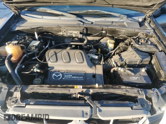 ✅ 2004 Mazda Tribute LX • VIN: 4F2YZ94114KM21798 • Lot: 91549685. Listed on Copart with 159,752 mi. Free auction sales archive from the USA and detailed vehicle history report at DreamBid. Image 12.