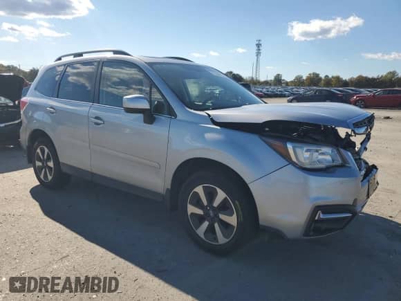 2017 Subaru Forester Limited with VIN JF2SJALC2HH407768, listed as a Copart auction lot 87364875 with 36,703 mi miles and Salvage title. Bid and sale history available at DreamBid. Image 4.