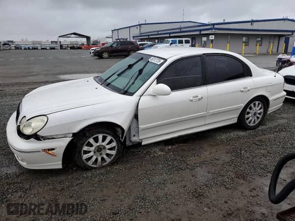 2004 Hyundai Sonata GLS с VIN KMHWF35H54A978952, выставлен на аукционе Copart как лот 49312725 с пробегом Не указан миль и Списание • Salvage title. История ставок и продаж доступна на DreamBid. Изображение 1.