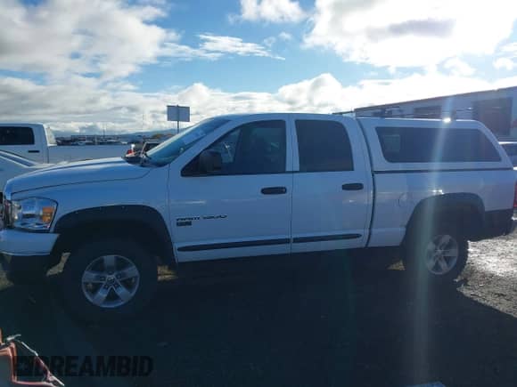 2007 Dodge 1500 SLT с VIN 1D7HU18267S151030, выставлен на аукционе IAAI как лот 43548494 с пробегом 181 891 миль миль и . История ставок и продаж доступна на DreamBid. Изображение 14.