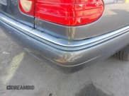 ✅ 1997 Mercedes-Benz E 320 • VIN: WDBJF55F7VA402305 • Lot: 41865470. Listed on IAAI with 210,577 mi. Free auction sales archive from the USA and detailed vehicle history report at DreamBid. Image 6.