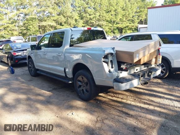 ✅ 2023 Ford F-150 Lightning Pro • VIN: 1FT6W1EV3PWG54808 • Lot: 43036931. Listed on IAAI with 42,398 mi. Free auction sales archive from the USA and detailed vehicle history report at DreamBid. Image 3.