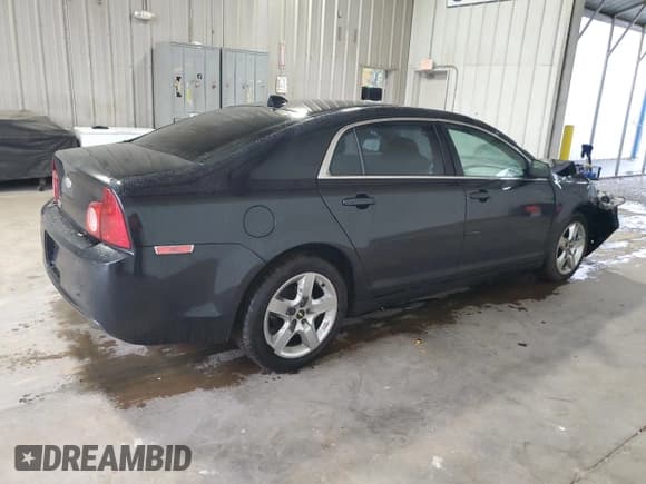 ✅ 2012 Chevrolet Malibu 1LS • VIN: 1G1ZB5E09CF282138 • Lot: 81303964. Listed on Copart with 166,577 mi. Free auction sales archive from the USA and detailed vehicle history report at DreamBid. Image 3.