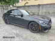 2021 BMW 3 Series M340i with VIN 3MW5U7J02M8B51836, listed as a Copart auction lot 80948675 with 79,331 mi miles and Salvage title. Bid and sale history available at DreamBid. Image 4.