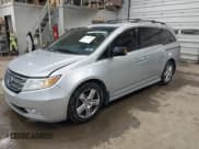 ✅ 2012 Honda Odyssey Touring • VIN: 5FNRL5H99CB052361 • Lot: 42332298. Listed on IAAI with 185,914 mi. Free auction sales archive from the USA and detailed vehicle history report at DreamBid. Image 2.