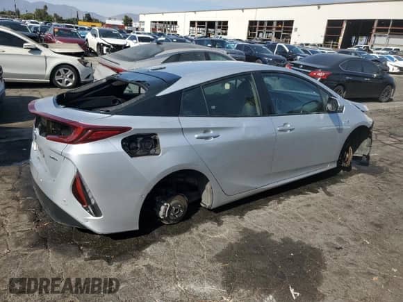 2022 Toyota Prius LE с VIN JTDKAMFP7N3228892, выставлен на аукционе Copart как лот 69565485 с пробегом 23 576 миль миль и Списание • Salvage title. История ставок и продаж доступна на DreamBid. Изображение 3.