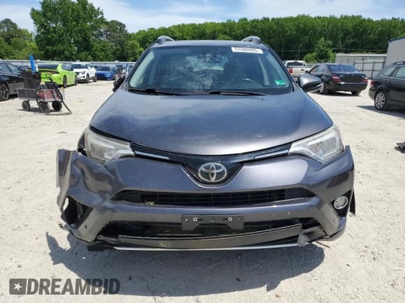 ✅ 2016 Toyota RAV4 Limited • VIN: JTMDFREVXGJ076533 • Lot: 57480995. Listed on Copart with 124,626 mi. Free auction sales archive from the USA and detailed vehicle history report at DreamBid. Image 6.