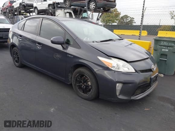 ✅ 2015 Toyota Prius Two • VIN: JTDKN3DU9F0461599 • Lot: 43523985. Listed on IAAI with 296,185 mi. Free auction sales archive from the USA and detailed vehicle history report at DreamBid. Image 1.