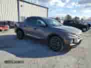 2022 Hyundai Santa Cruz SEL с VIN 5NTJCDAE5NH014579, выставлен на аукционе Copart как лот 80882384 с пробегом 36 221 миль миль и Списание • Salvage title. История ставок и продаж доступна на DreamBid. Изображение 4.