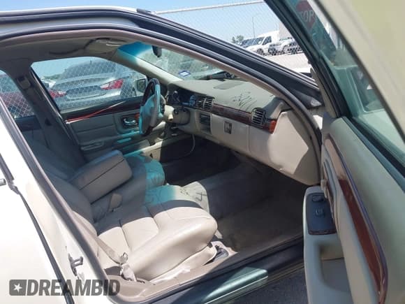 ✅ 1998 Cadillac DeVille • VIN: 1G6KD54Y7WU770095 • Lot: 42768681. Listed on IAAI with Not provided. Free auction sales archive from the USA and detailed vehicle history report at DreamBid. Image 5.