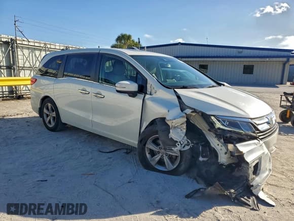 ✅ 2019 Honda Odyssey EX-L • VIN: 5FNRL6H7XKB004158 • Lot: 95319985. Listed on Copart with 78,769 mi. Free auction sales archive from the USA and detailed vehicle history report at DreamBid. Image 4.