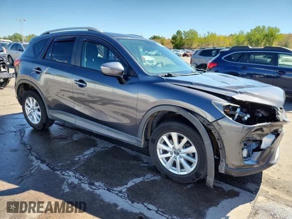 ✅ 2016 Mazda CX-5 Touring • VIN: JM3KE4CY6G0662637 • Lot: 80868985. Wystawiony na Copart z przebiegiem 83 661 mil. Bezpłatny archiwum sprzedaży aukcyjnych z USA i szczegółowy raport historii pojazdu na DreamBid. Zdjęcie 4.