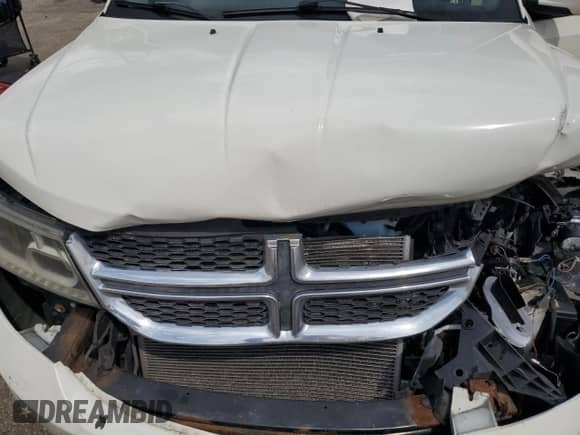 2012 Dodge Journey SXT с VIN 3C4PDCCG4CT243492, выставлен на аукционе Copart как лот 59908485 с пробегом 319 175 миль миль и Списание • Salvage title. История ставок и продаж доступна на DreamBid. Изображение 12.