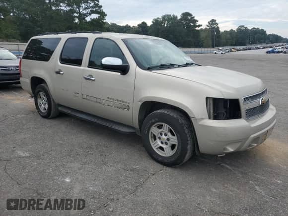 2007 Chevrolet Suburban LT z VIN 1GNFC16027J289845, wystawiony jako Copart lot #81099795 z przebiegiem 137 667 mil mil oraz Szkoda całkowita • Salvage title. Historia ofert i sprzedaży dostępna na DreamBid. Obrazek 4.