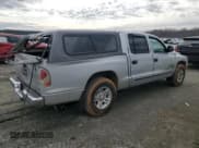 ✅ 2001 Dodge Dakota Sport • VIN: 1B7HL2AN71S275967 • Lot: 42954505. Wystawiony na Copart z przebiegiem 168 681 mil. Bezpłatny archiwum sprzedaży aukcyjnych z USA i szczegółowy raport historii pojazdu na DreamBid. Zdjęcie 3.