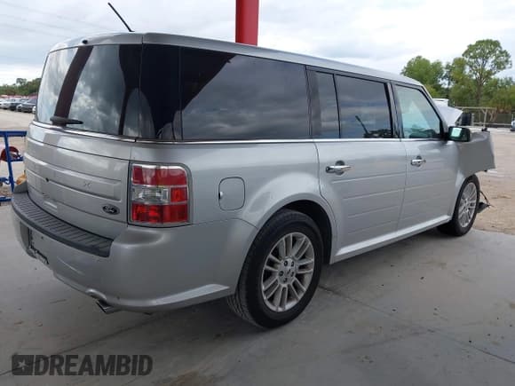 ✅ 2019 Ford Flex SEL • VIN: 2FMGK5C88KBA14247 • Lot: 43643779. Listed on IAAI with 100,898 mi. Free auction sales archive from the USA and detailed vehicle history report at DreamBid. Image 4.