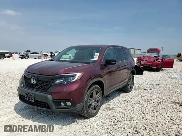 ✅ 2020 Honda Passport EX-L • VIN: 5FNYF8H57LB014709 • Lot: 71562815. Listed on Copart with 73,522 mi. Free auction sales archive from the USA and detailed vehicle history report at DreamBid. Image 14.