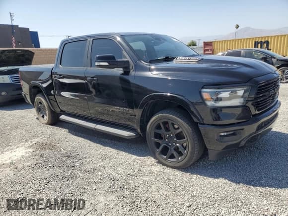 ✅ 2021 Ram 1500 Laramie • VIN: 1C6SRFJM5MN598833 • Lot: 61274845. Wystawiony na Copart z przebiegiem 105 722 mil. Bezpłatny archiwum sprzedaży aukcyjnych z USA i szczegółowy raport historii pojazdu na DreamBid. Zdjęcie 4.
