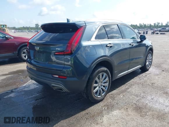 ✅ 2021 Cadillac XT4 FWD Premium Luxury • VIN: 1GYFZCR42MF007617 • Лот: 42437974. Опубликован ранее на IAAI с пробегом 126 071 миль. Бесплатный доступ к архиву аукционных продаж из США и подробный отчёт об истории автомобиля на DreamBid. Изображение 4.