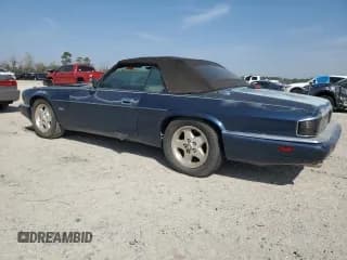 ✅ 1995 Jaguar XJS • VIN: SAJNX2748SC221676 • Лот: 49185945. Опубликован ранее на Copart с пробегом 160 087 миль. Бесплатный доступ к архиву аукционных продаж из США и подробный отчёт об истории автомобиля на DreamBid. Изображение 2.