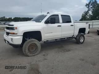 2017 Chevrolet Silverado 1500 LT с VIN 3GCUKREC6HG305139, выставлен на аукционе Copart как лот 71966685 с пробегом 132 784 миль миль и Списание • Salvage title. История ставок и продаж доступна на DreamBid. Изображение 1.
