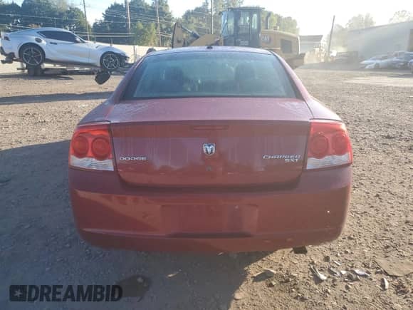 2010 Dodge Charger SXT с VIN 2B3CA3CV0AH186799, выставлен на аукционе Copart как лот 70600884 с пробегом 206 635 миль миль и Списание • Salvage title. История ставок и продаж доступна на DreamBid. Изображение 6.