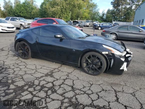 ✅ 2009 Nissan 370Z Touring • VIN: JN1AZ44E49M400966 • Lot: 84711895. Listed on Copart with 100,508 mi. Free auction sales archive from the USA and detailed vehicle history report at DreamBid. Image 4.