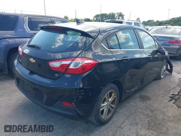 ✅ 2018 Chevrolet Cruze LT • VIN: 3G1BE6SM8JS530927 • Lot: 43137779. Listed on IAAI with 155,527 mi. Free auction sales archive from the USA and detailed vehicle history report at DreamBid. Image 4.