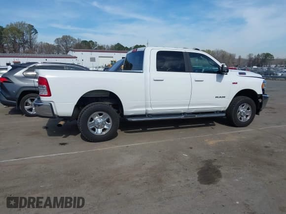 ✅ 2021 Ram 2500 Big Horn • VIN: 3C6UR5DJ8MG552586 • Лот: 41826654. Опубликован ранее на IAAI с пробегом 82 847 миль. Бесплатный доступ к архиву аукционных продаж из США и подробный отчёт об истории автомобиля на DreamBid. Изображение 13.