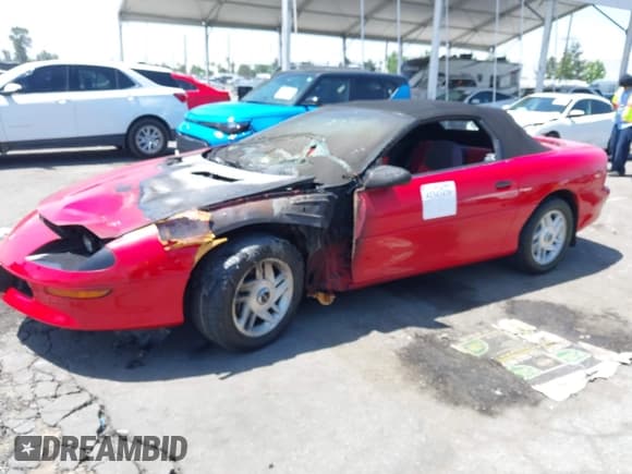 ✅ 1994 Chevrolet Camaro Z28 • VIN: 2G1FP32P2R2137303 • Лот: 42343430. Опубликован ранее на IAAI с пробегом Не указан. Бесплатный доступ к архиву аукционных продаж из США и подробный отчёт об истории автомобиля на DreamBid. Изображение 2.