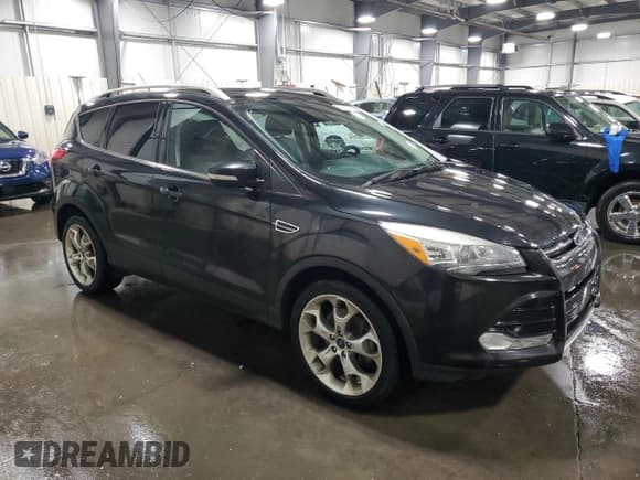✅ 2015 Ford Escape Titanium • VIN: 1FMCU9J90FUC25986 • Lot: 89878505. Listed on Copart with 127,376 mi. Free auction sales archive from the USA and detailed vehicle history report at DreamBid. Image 4.