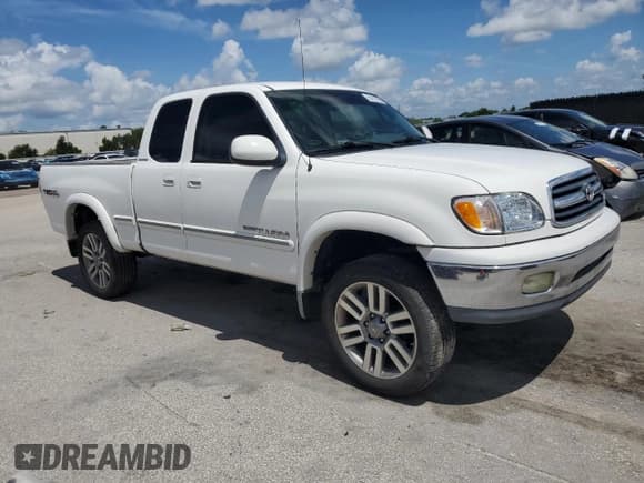 ✅ 2002 Toyota Tundra Limited • VIN: 5TBRT381X2S296358 • Lot: 65013025. Listed on Copart with 142,104 mi. Free auction sales archive from the USA and detailed vehicle history report at DreamBid. Image 4.