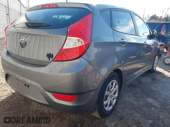 ✅ 2013 Hyundai Accent GS • VIN: KMHCT5AE9DU123205 • Lot: 43864921. Listed on IAAI with 197,257 mi. Free auction sales archive from the USA and detailed vehicle history report at DreamBid. Image 4.