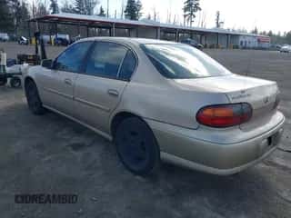 2003 Chevrolet Malibu LS z VIN 1G1NE52J63M721617, wystawiony jako IAAI lot #41732035 z przebiegiem 109 318 mil mil oraz . Historia ofert i sprzedaży dostępna na DreamBid. Obrazek 3.