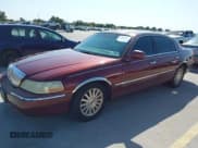 ✅ 2003 Lincoln Town Car Executive • VIN: 1LNHM81W83Y670986 • Lot: 43500551. Listed on IAAI with 149,680 mi. Free auction sales archive from the USA and detailed vehicle history report at DreamBid. Image 2.