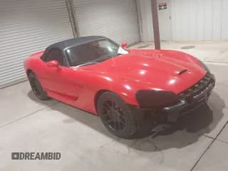 ✅ 2003 Dodge Viper SRT-10 • VIN: 1B3JR65ZX3V501667 • Lot: 42926637. Listed on IAAI with 26,405 mi. Free auction sales archive from the USA and detailed vehicle history report at DreamBid. Image 1.