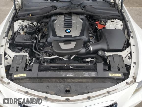 ✅ 2007 BMW 6 Series 650i • VIN: WBAEK13517CN84217 • Lot: 87413775. Wystawiony na Copart z przebiegiem 92 851 mil. Bezpłatny archiwum sprzedaży aukcyjnych z USA i szczegółowy raport historii pojazdu na DreamBid. Zdjęcie 11.