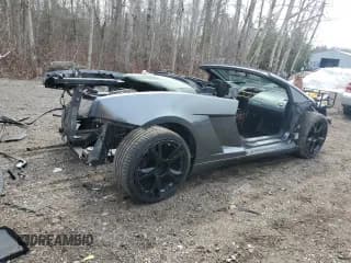 ✅ 2009 Lamborghini Gallardo • VIN: ZHWGU64T19LA08723 • Лот: 53265785. Опубликован ранее на Copart с пробегом Не указан. Бесплатный доступ к архиву аукционных продаж из США и подробный отчёт об истории автомобиля на DreamBid. Изображение 3.