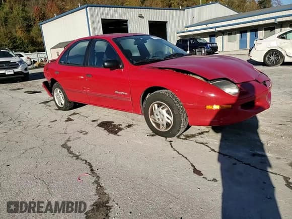 ✅ 1999 Pontiac Sunfire SE • VIN: 1G2JB524XX7510471 • Лот: 91023265. Опубликован ранее на Copart с пробегом 157 565 миль. Бесплатный доступ к архиву аукционных продаж из США и подробный отчёт об истории автомобиля на DreamBid. Изображение 13.