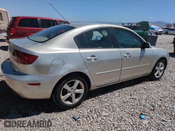 ✅ 2004 Mazda 3 i • VIN: JM1BK32F541118969 • Лот: 64134785. Опубликован ранее на Copart с пробегом 148 914 миль. Бесплатный доступ к архиву аукционных продаж из США и подробный отчёт об истории автомобиля на DreamBid. Изображение 3.