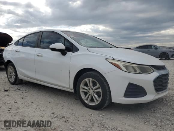 ✅ 2019 Chevrolet Cruze LS • VIN: 1G1BC5SMXK7102289 • Lot: 86277365. Listed on Copart with 145,500 mi. Free auction sales archive from the USA and detailed vehicle history report at DreamBid. Image 4.