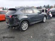 ✅ 2013 Mazda CX-5 Grand Touring • VIN: JM3KE4DE9D0129147 • Лот: 43575564. Опубликован ранее на IAAI с пробегом 106 955 миль. Бесплатный доступ к архиву аукционных продаж из США и подробный отчёт об истории автомобиля на DreamBid. Изображение 4.